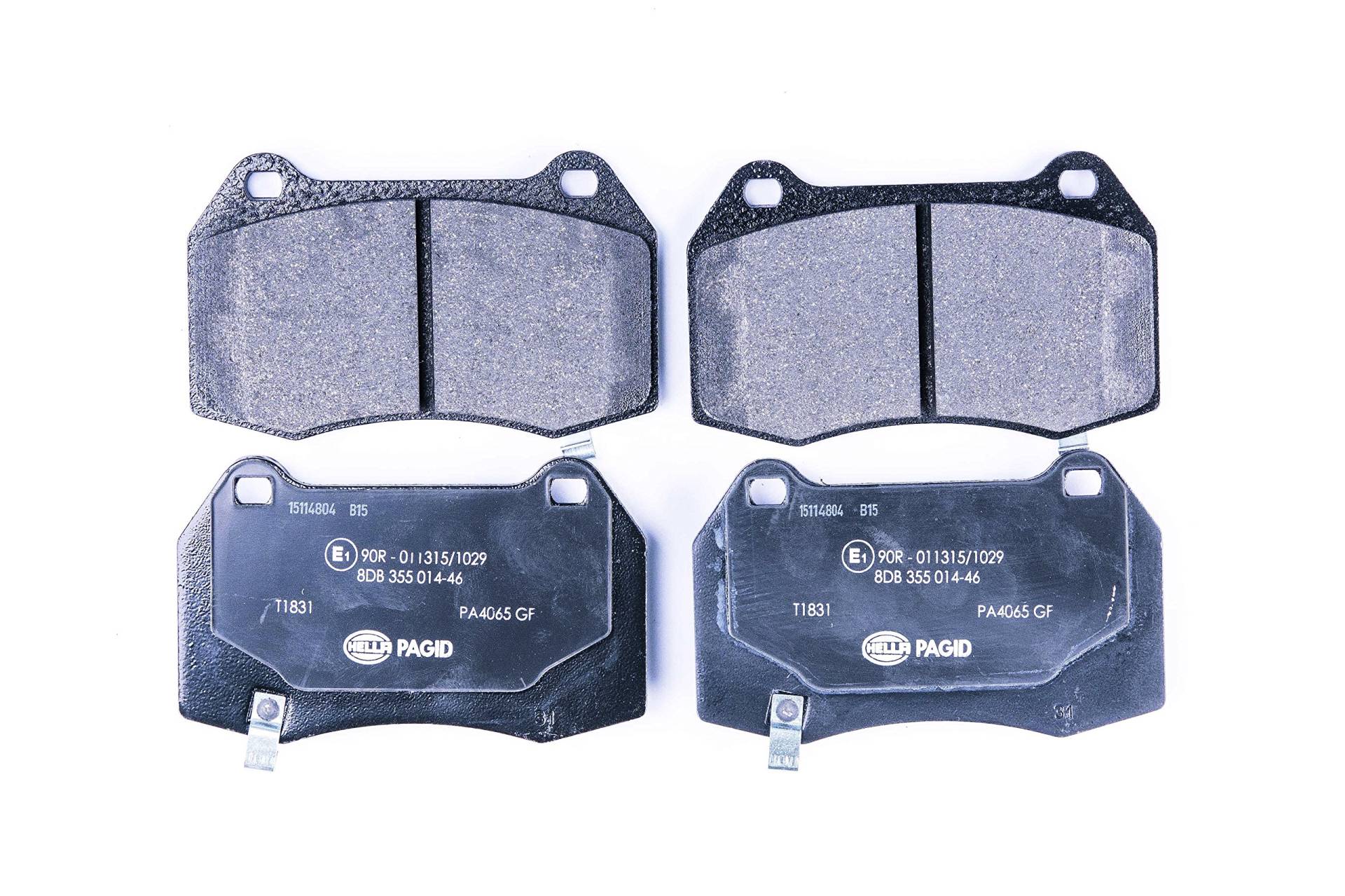 HELLA PAGID Bremsbeläge hinten - mit akustischer Verschleißwarnung - vier Bremsbeläge pro Set - T1831 - für u.a. CADILLAC - 8DB 355 014-461 von Hella