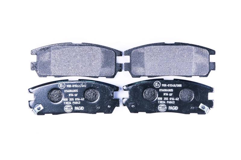 HELLA PAGID Bremsbeläge hinten - mit akustischer Verschleißwarnung - vier Bremsbeläge pro Set - T3034 - für u.a. ACURA / CHEVROLET / HOLDEN / HONDA - 8DB 355 016-621 von Hella