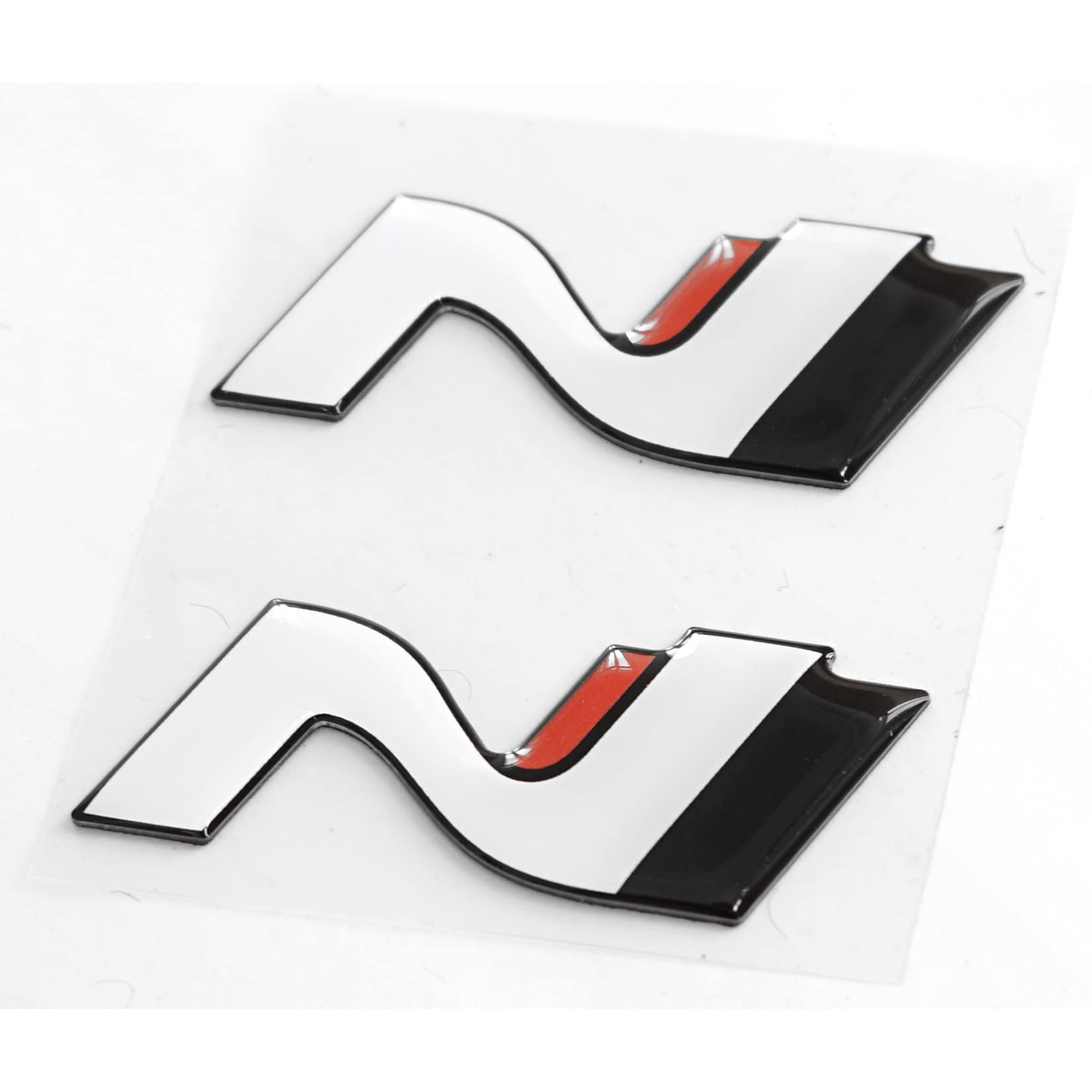 Hyundai 9999Z057169 Schriftzug N-Logo Batch Emblem Aufkleber, 2-teilig von Hyundai